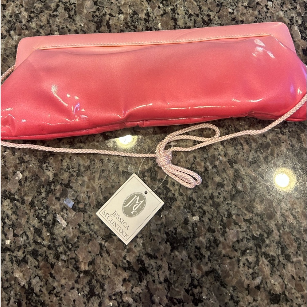 Brand new with tags Jessica McClintock pink clutch purse
